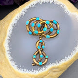 Antique 18K & Turquoise Serpentine Love Knot Brooch