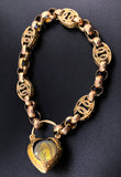 Antique 9K & Garnet Padlock Gate Bracelet
