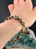 Antique 9K & Garnet Padlock Gate Bracelet